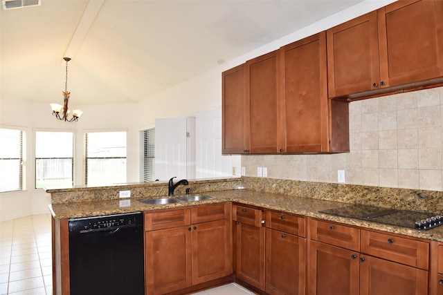 kitchen with black appliances, a sink, a peninsula, stone counters, and vaulted ceiling