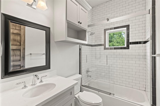 1202 Archer St, Houston, TX 77009 - bathroom featuring toilet, vanity, and combined bath / shower with glass door
