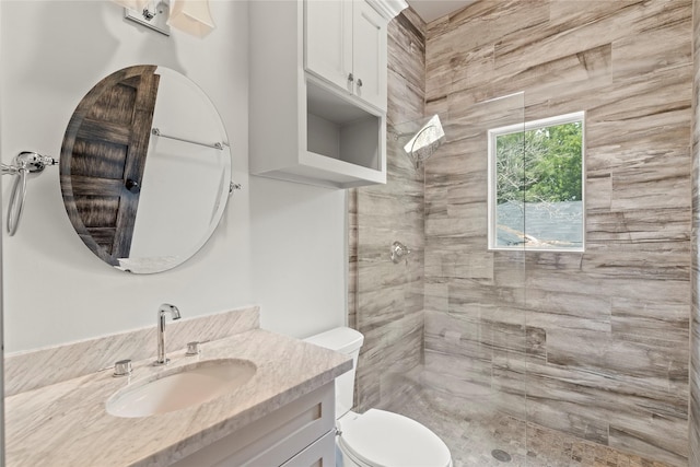 1202 Archer St, Houston, TX 77009 - bathroom with a tile shower, vanity, and toilet