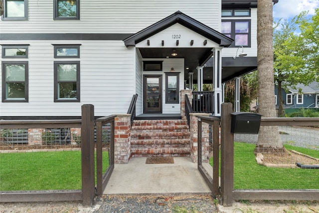 1202 Archer St, Houston, TX 77009 - doorway to property with a lawn
