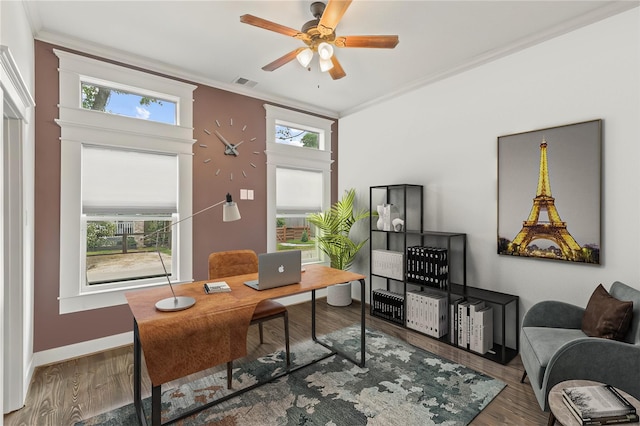 1202 Archer St, Houston, TX 77009 - office area with ornamental molding, ceiling fan, wood finished floors, and baseboards