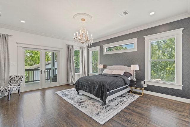 1202 Archer St, Houston, TX 77009 - bedroom with access to exterior, a chandelier, wood finished floors, ornamental molding, and french doors