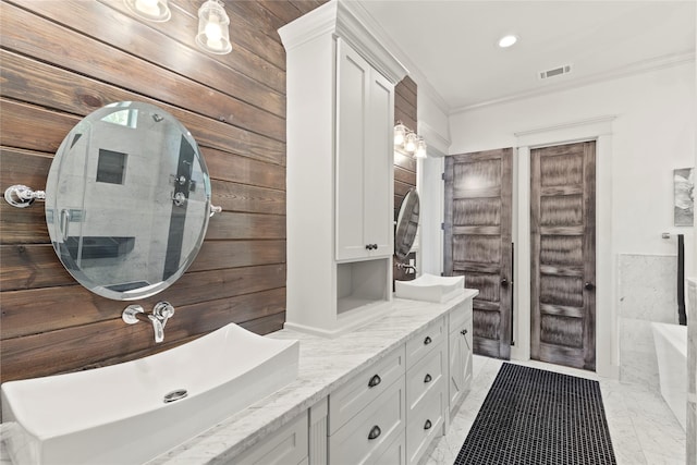 1202 Archer St, Houston, TX 77009 - full bathroom with double vanity, a bath, crown molding, marble finish floors, and recessed lighting