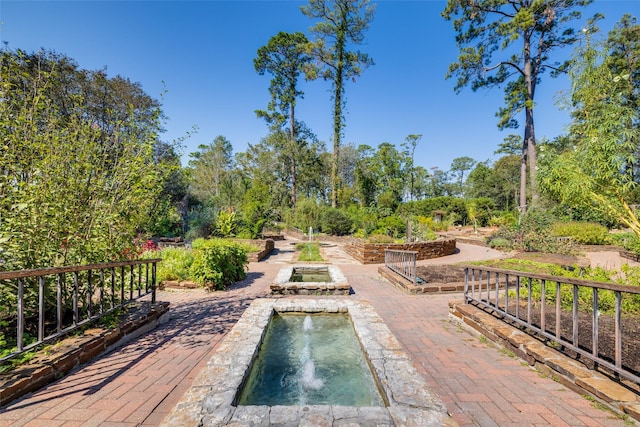 12519 Mountain Daisy Rd, Houston, TX 77038 - view of pool with view of wooded area