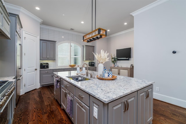 856 Dunleigh Meadows Ln, Houston, TX 77055 - kitchen with a sink, gray cabinetry, ornamental molding, stainless steel appliances, and an island with sink