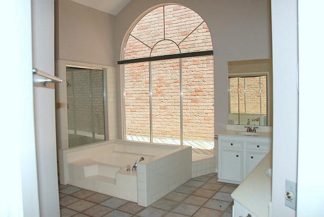 2118 Linea Del Pino St, Houston, TX 77077 - full bathroom with vanity, a bath, and tile patterned floors