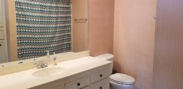 2118 Linea Del Pino St, Houston, TX 77077 - bathroom with toilet, vanity, and curtained shower
