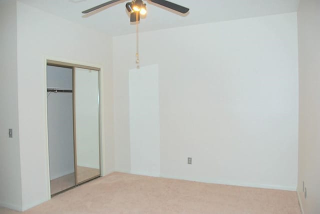 2118 Linea Del Pino St, Houston, TX 77077 - unfurnished bedroom with carpet floors, a closet, and a ceiling fan