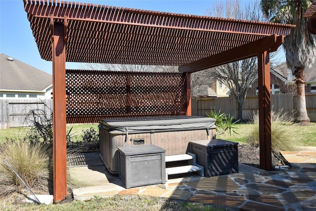 2603 Briar Rose Ct, Pearland, TX 77584 - view of patio / terrace featuring a hot tub and a fenced backyard