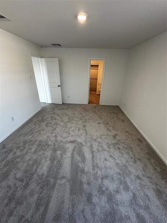 12414 Lady Slipper Rd, Houston, TX 77038 - unfurnished bedroom featuring carpet and baseboards