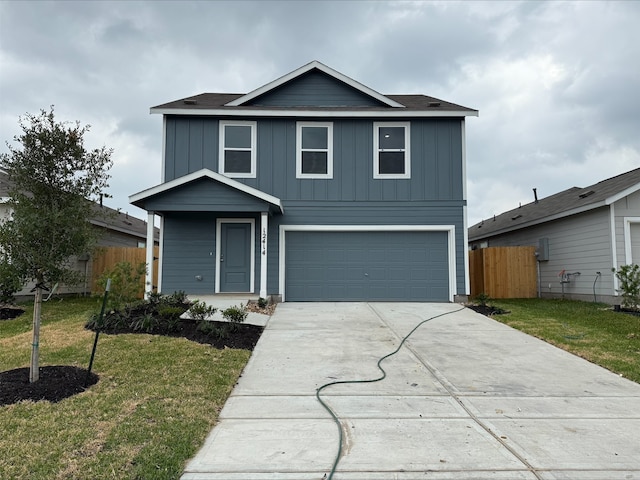 12414 Lady Slipper Rd, Houston, TX 77038 - traditional-style house with board and batten siding, a garage, driveway, and a shingled roof