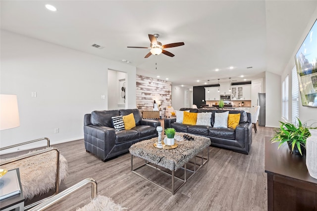 208 Catalina Cove Dr, Katy, TX 77493 - living room featuring recessed lighting, a ceiling fan, light wood-style flooring, and baseboards