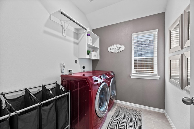 208 Catalina Cove Dr, Katy, TX 77493 - clothes washing area with separate washer and dryer, light tile patterned floors, and baseboards