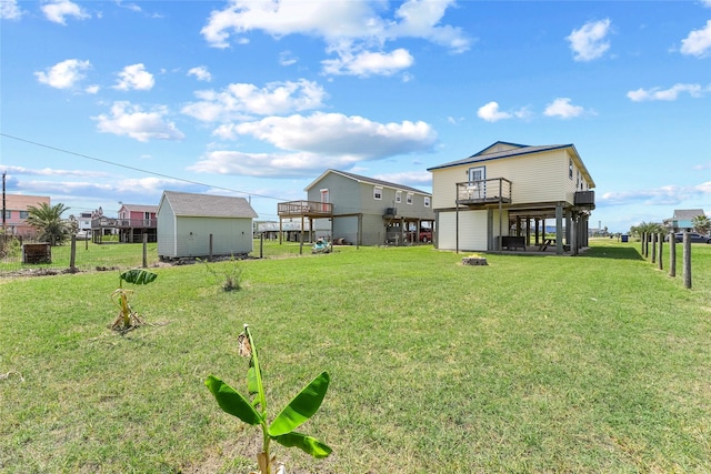 424 Angel Wing St, Surfside Beach, TX 77541 - view of yard featuring a wooden deck