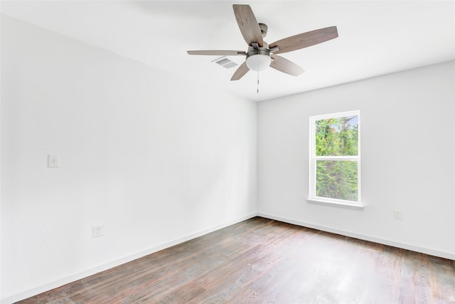 18586 Summer Hills Blvd, Porter, TX 77365 - spare room featuring wood finished floors, a ceiling fan, and baseboards