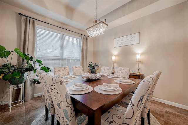 182 Climbing Oaks Pl, Montgomery, TX 77316 - dining space with baseboards, a chandelier, and stone tile floors