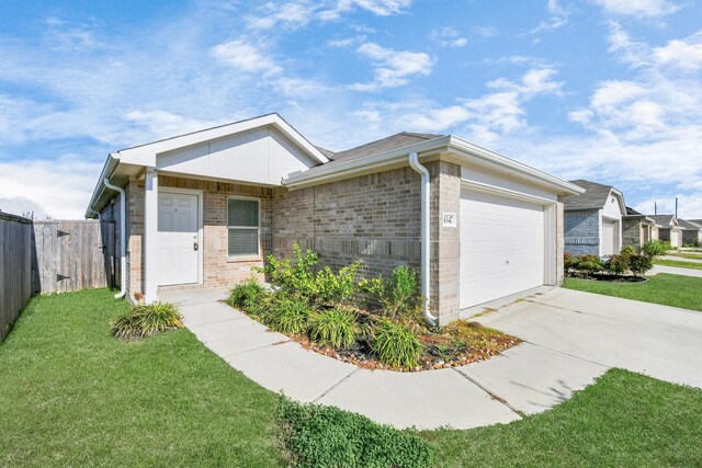 4347 Palmetto Grove Ln, Baytown, TX 77521 - single story home with a garage, brick siding, and concrete driveway