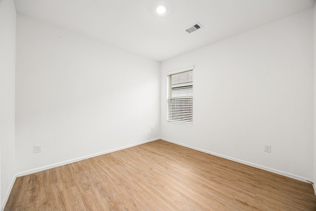 4347 Palmetto Grove Ln, Baytown, TX 77521 - spare room with light wood finished floors and baseboards