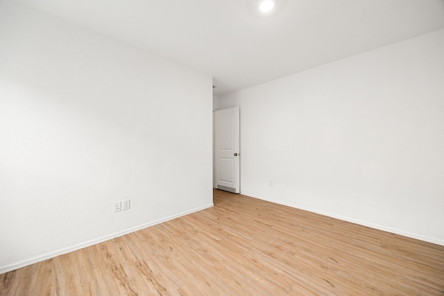 4347 Palmetto Grove Ln, Baytown, TX 77521 - unfurnished room featuring light wood finished floors and baseboards