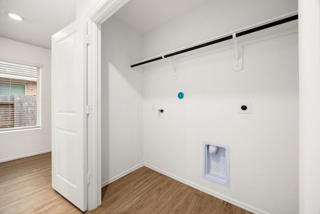 4347 Palmetto Grove Ln, Baytown, TX 77521 - washroom with light wood-style flooring, hookup for an electric dryer, baseboards, and recessed lighting