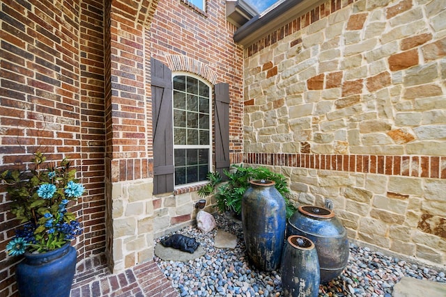 18910 Winding Atwood Ln, Tomball, TX 77377 - doorway to property with stone siding and brick siding