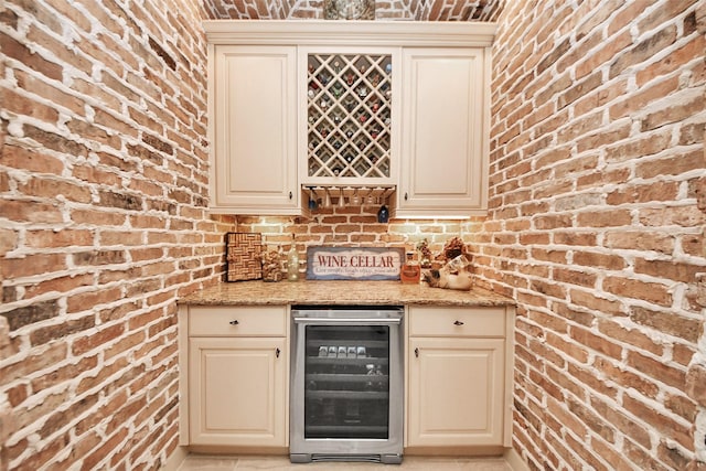 18910 Winding Atwood Ln, Tomball, TX 77377 - indoor dry bar with wine cooler and brick wall