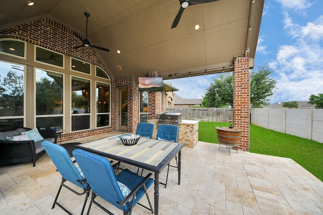 18910 Winding Atwood Ln, Tomball, TX 77377 - fenced backyard featuring ceiling fan, area for grilling, a patio area, and outdoor dining area