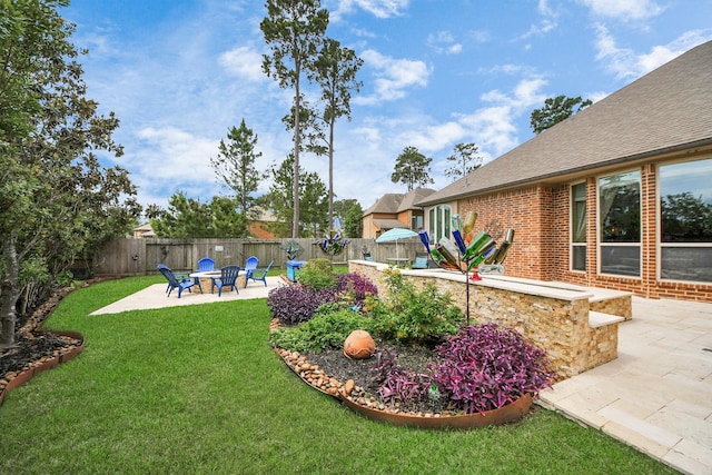 18910 Winding Atwood Ln, Tomball, TX 77377 - view of yard with a patio and a fire pit