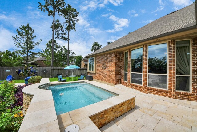 18910 Winding Atwood Ln, Tomball, TX 77377 - view of pool featuring a patio and a fenced backyard