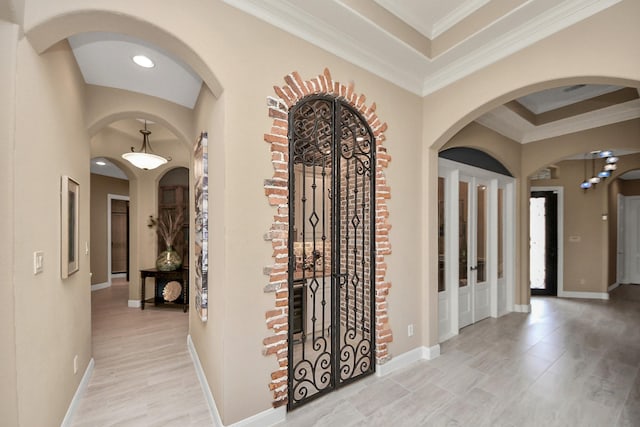 18910 Winding Atwood Ln, Tomball, TX 77377 - corridor with crown molding, arched walkways, recessed lighting, and baseboards