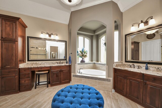 18910 Winding Atwood Ln, Tomball, TX 77377 - full bathroom featuring a garden tub, crown molding, two vanities, and a tile shower