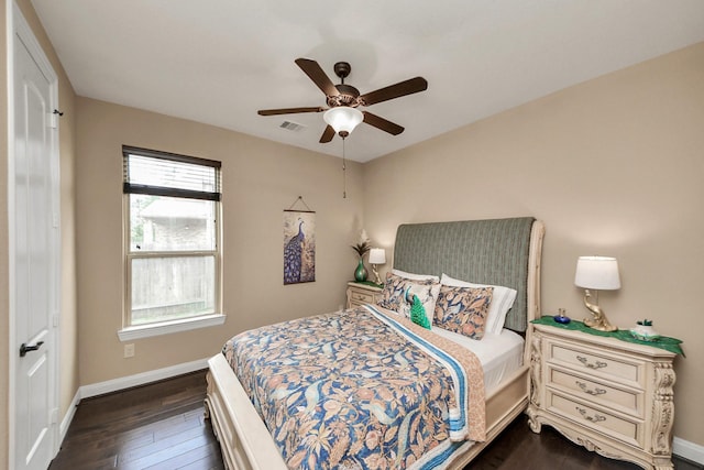 18910 Winding Atwood Ln, Tomball, TX 77377 - bedroom with baseboards, dark wood-style flooring, and ceiling fan