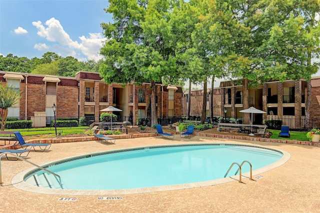 7575 Katy Fwy Unit 17, Houston, TX 77024 - community pool featuring fence and a patio