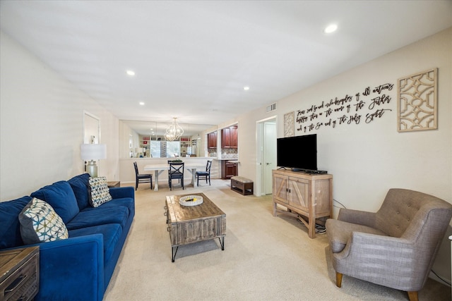 7575 Katy Fwy Unit 17, Houston, TX 77024 - living area with a chandelier, recessed lighting, and light carpet