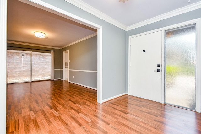 2808 Cypress Point Dr, Missouri City, TX 77459 - entryway with wood finished floors, ornamental molding, and baseboards