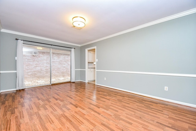 2808 Cypress Point Dr, Missouri City, TX 77459 - unfurnished bedroom featuring wood finished floors, baseboards, and crown molding