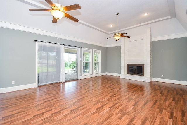 2808 Cypress Point Dr, Missouri City, TX 77459 - unfurnished living room with ceiling fan, baseboards, wood finished floors, a brick fireplace, and recessed lighting