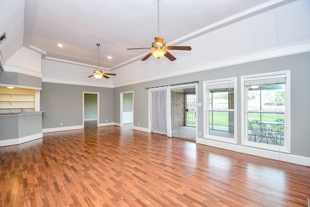 2808 Cypress Point Dr, Missouri City, TX 77459 - unfurnished living room featuring a textured ceiling, ceiling fan, wood finished floors, baseboards, and recessed lighting