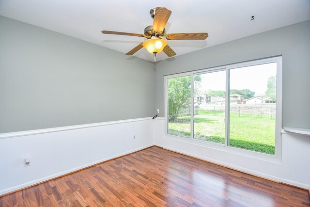 2808 Cypress Point Dr, Missouri City, TX 77459 - unfurnished room featuring wood finished floors, baseboards, and ceiling fan