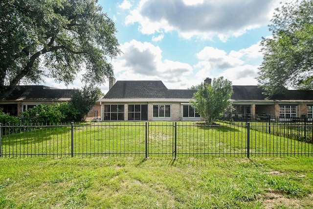 2808 Cypress Point Dr, Missouri City, TX 77459 - back of property featuring a chimney and brick siding