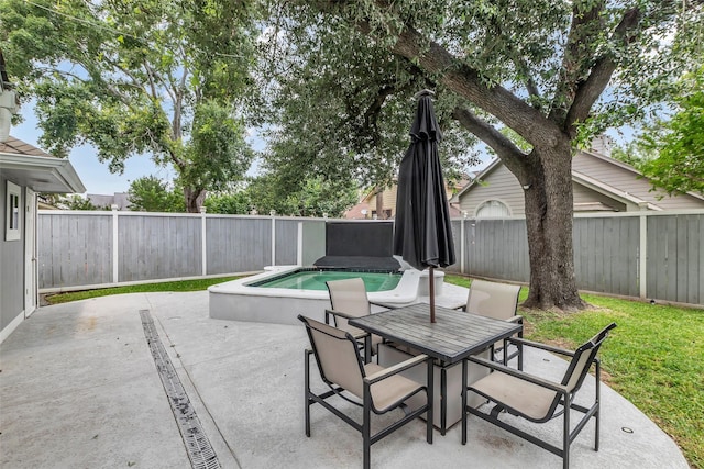 9802 Pale Star Dr, Houston, TX 77064 - fenced backyard featuring a patio and outdoor dining space