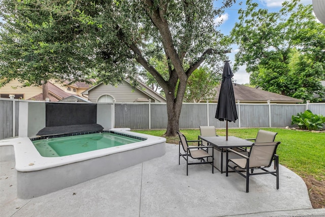 9802 Pale Star Dr, Houston, TX 77064 - view of patio featuring an in-ground hot tub and outdoor dining area