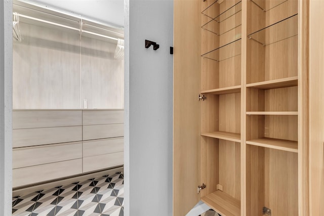 9802 Pale Star Dr, Houston, TX 77064 - spacious closet with tile patterned floors