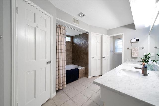 12806 Ivyforest Dr, Cypress, TX 77429 - bathroom with tile patterned floors, double vanity, and shower / bath combo