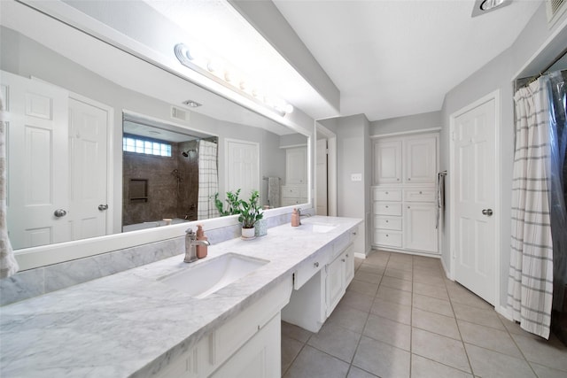 12806 Ivyforest Dr, Cypress, TX 77429 - bathroom featuring tile patterned flooring, curtained shower, and double vanity