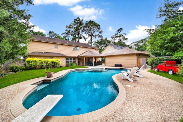12806 Ivyforest Dr, Cypress, TX 77429 - view of swimming pool featuring a gazebo, a patio, a diving board, and a pool with connected hot tub