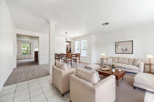 815 Spring Valley Ct, Sugar Land, TX 77479 - living room featuring healthy amount of natural light, crown molding, light carpet, and baseboards