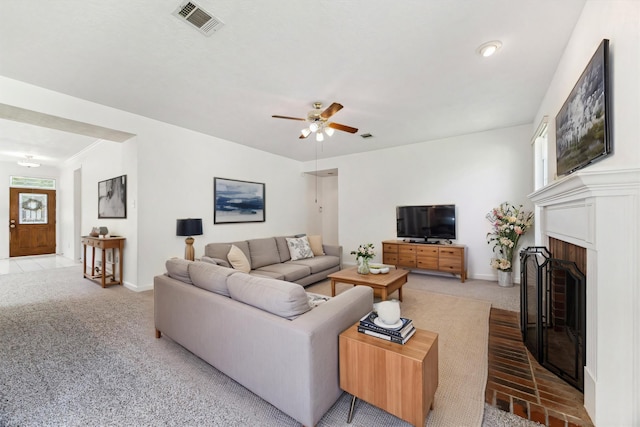 815 Spring Valley Ct, Sugar Land, TX 77479 - carpeted living room with ceiling fan, a brick fireplace, and baseboards