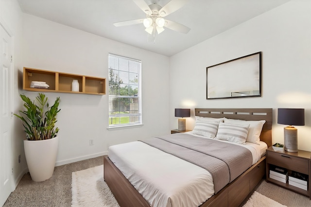 815 Spring Valley Ct, Sugar Land, TX 77479 - bedroom with light carpet, baseboards, and a ceiling fan