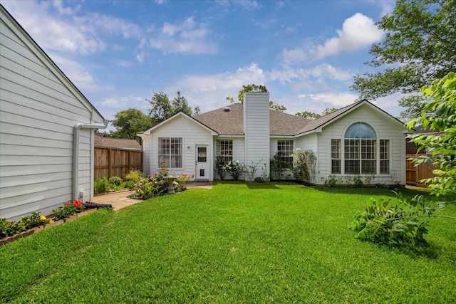 815 Spring Valley Ct, Sugar Land, TX 77479 - rear view of property with a shingled roof and a chimney